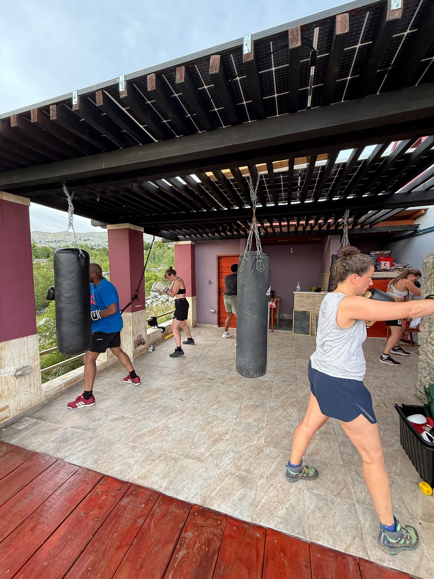 Morning bag work under the solar pergola at the mountain house