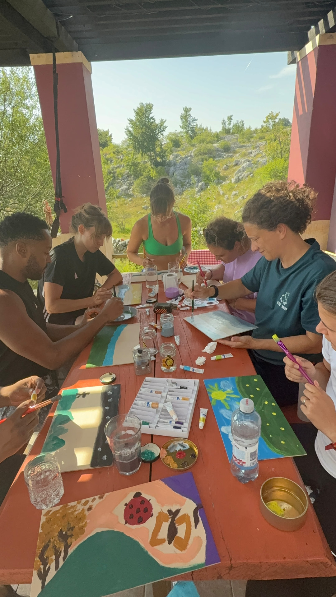 Painting afternoon at the long red table